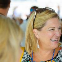 A guest laughing at the Jamie Hosford Football Center dedication.